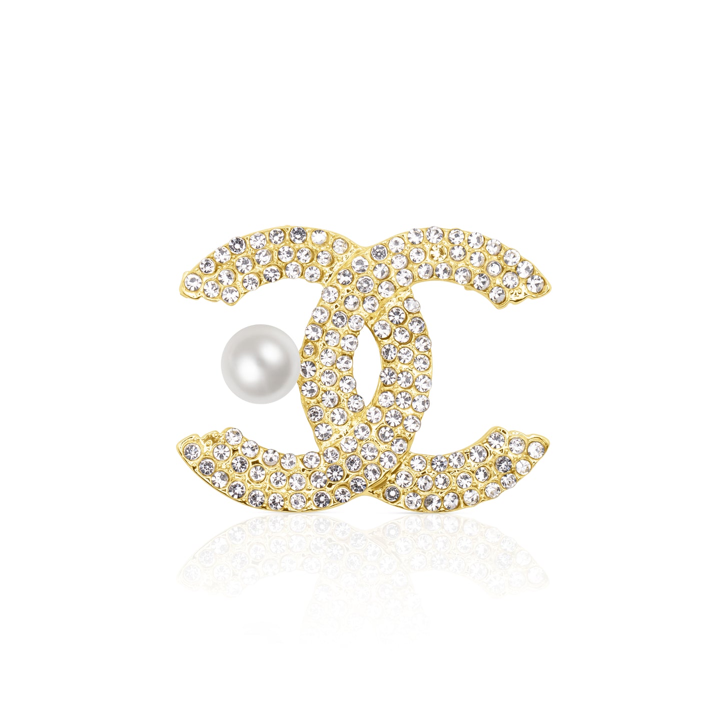 A glamorous gold-tone double C brooch encrusted with shimmering clear crystals, featuring a white faux pearl detail for added elegance. Stylish and iconic, this brooch is perfect for elevating both everyday and formal outfits with a luxurious flair.