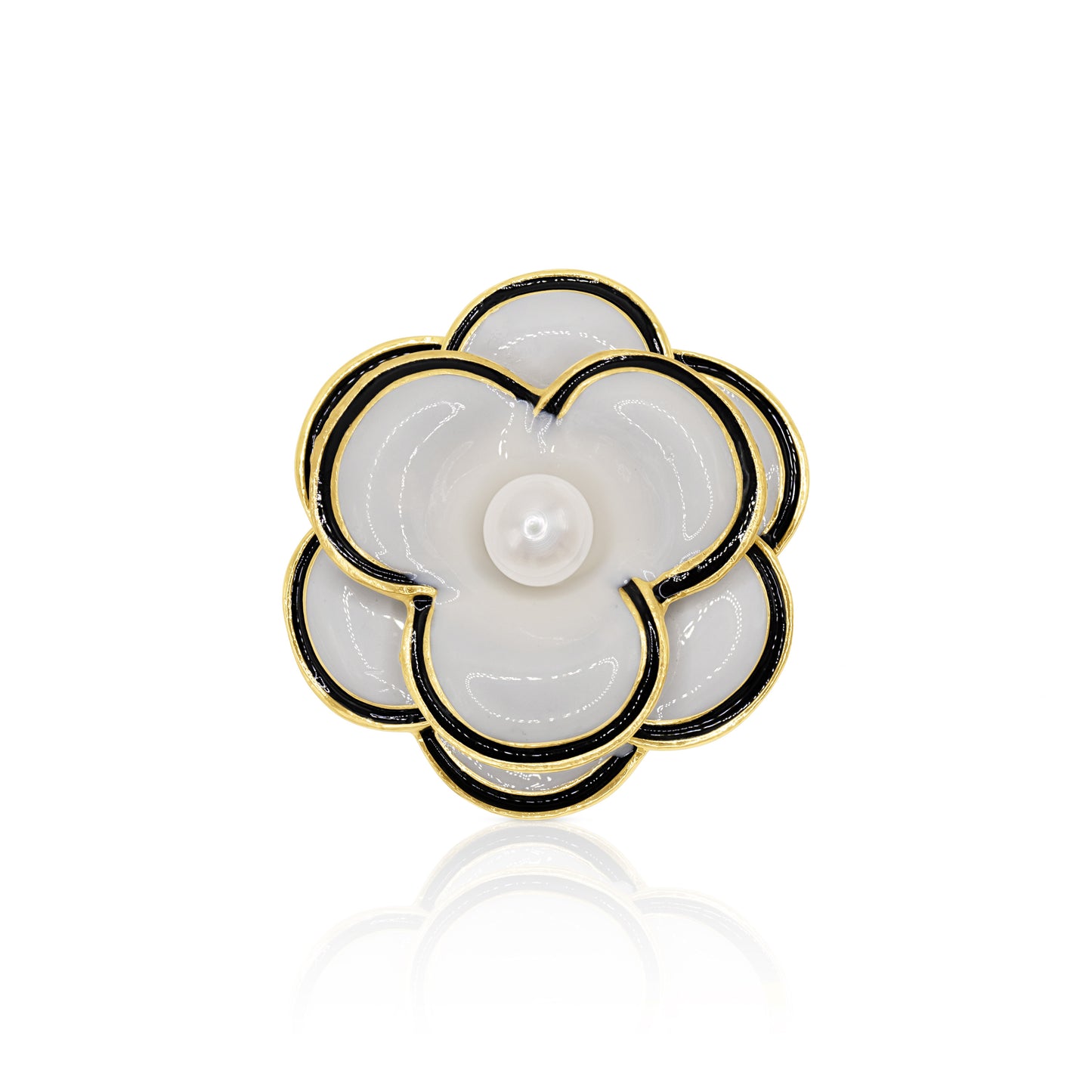 A chic black and white camellia flower brooch with a lustrous faux pearl center. The polished gold-tone base and secure pin closure make it an exquisite accessory for any vintage-inspired look.