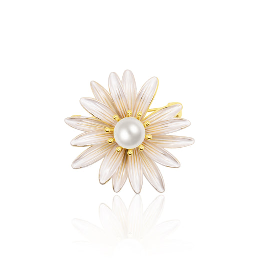 A beautifully crafted daisy-inspired brooch with a white faux pearl center, gold-plated petals, and a secure pin closure, representing grace and nature’s beauty.