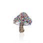 A charming mushroom-shaped brooch adorned with pink, blue, and brown iridescent crystals on a silver-tone base, perfect for adding a playful touch to any look.
