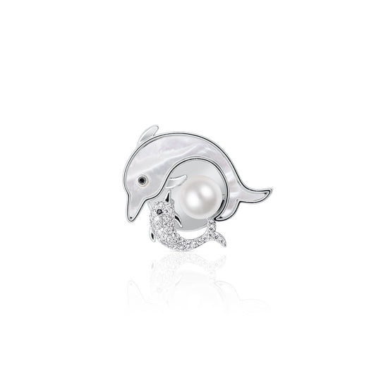 Ocean Harmony Dolphin Pearl Brooch featuring a dolphin with mother-of-pearl accents and a sparkling crystal design. An elegant piece inspired by the beauty of the ocean, perfect for adding a touch of aquatic charm.