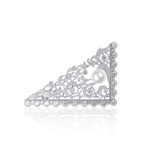 Majestic Pearl Filigree Triangle Brooch featuring a delicate triangle pattern, crafted from silver-tone alloy with an ornate filigree design and a luminous pearl. Ideal for adding a sophisticated touch to formal attire.